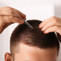 Hair growth/regrowth